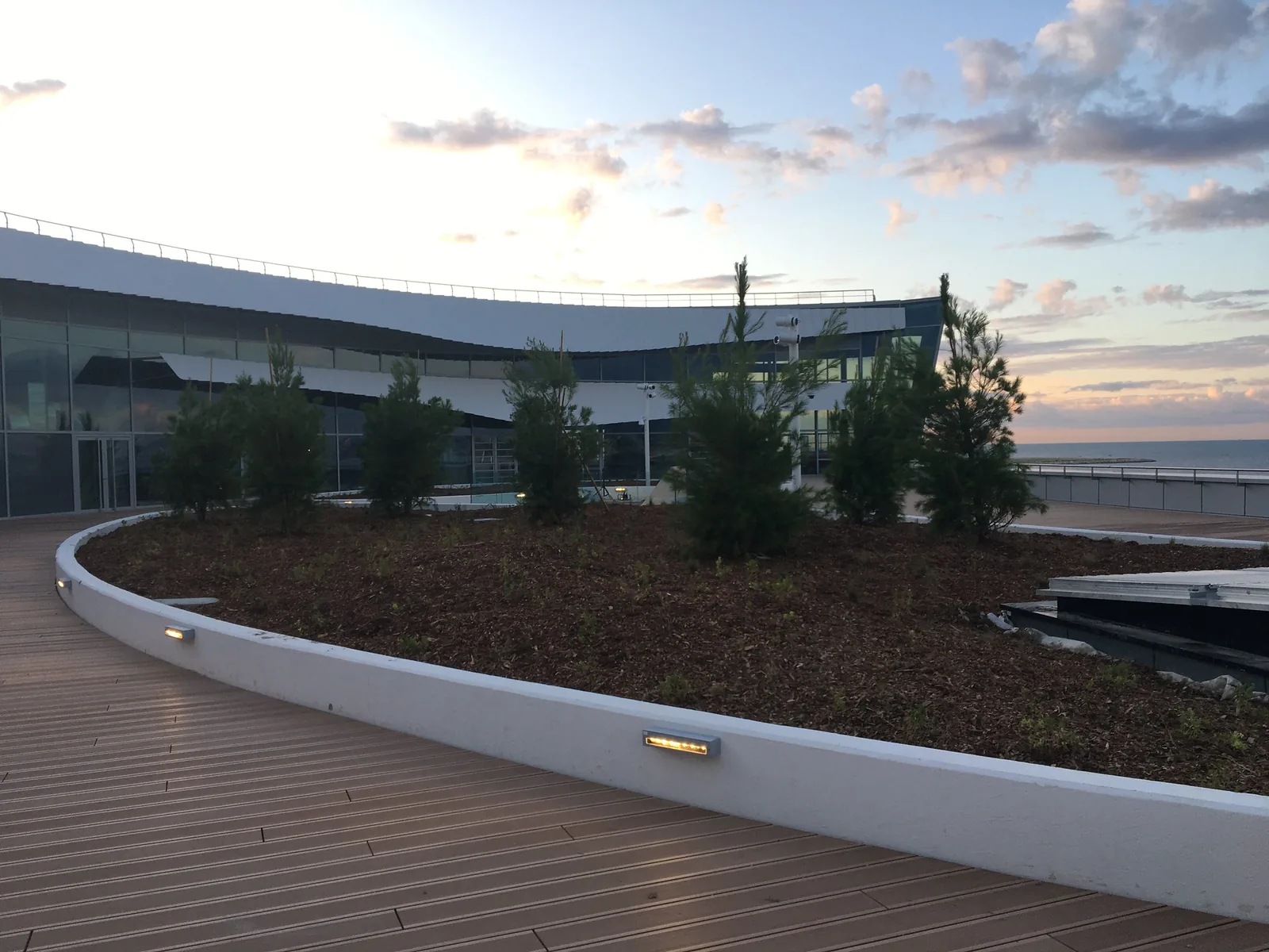 Large planter integrated into a terrace